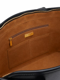 Interior view — soft cognac lining, zip pocket and gold Blessac plaque