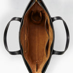 Top-down open view of the roomy interior with zip and slip pockets