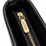 Gold-tone Blessac engraved zipper pull close-up
