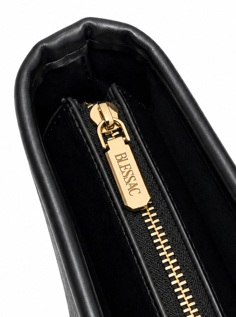 Gold-tone Blessac engraved zipper pull close-up