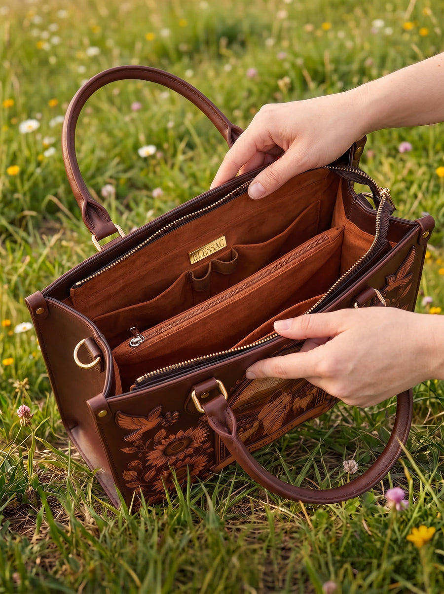 Open handbag showing 4 organized interior compartments