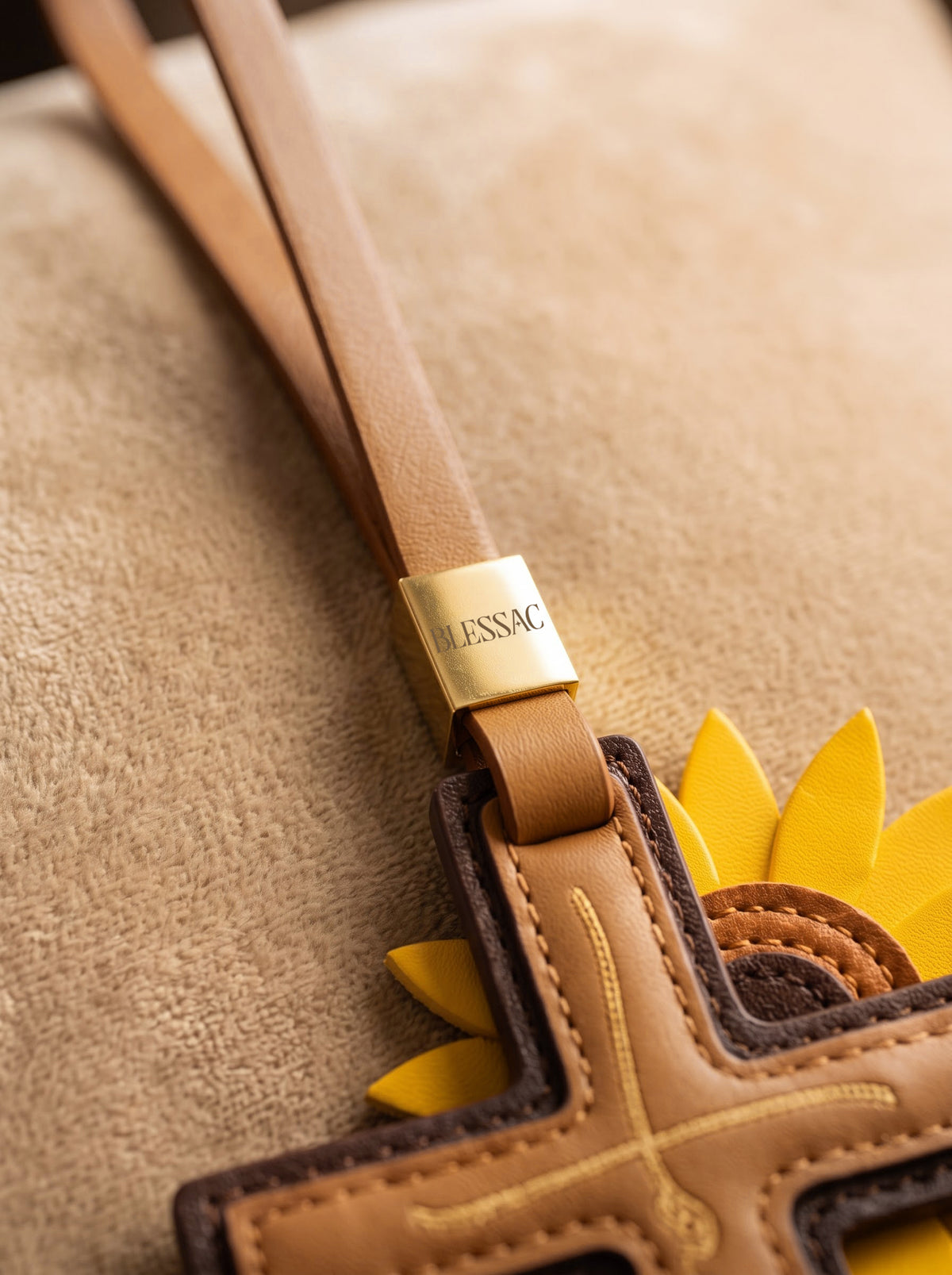 "Rooted in Faith" - Sunflower Cross Leather Bag Charm